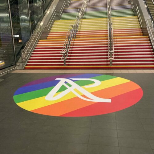 colourful floor graphics on stairs